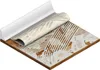 A close-up, isometric view of a flooring sample with a piece of trim. Voir les images du produit