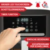 A close-up of an air fryer's control panel with a hand touching the screen. Produktbild-Vorschau