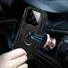 A hand holding a black phone case with a ring holder, which is magnetically attached to a rose gold car vent mount. Produktbild-Vorschau