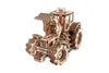 A wooden model tractor on a white background. Anteprima dell’immagine prodotto