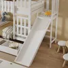 A white bunk bed with a slide, drawers, and a ladder, set up in a child's room. Podgląd zdjęcia produktu