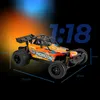 A remote-controlled car with dimensions and scale indicated, set against a dark background with colored lighting. Anteprima dell’immagine prodotto