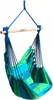 A hanging chair with a striped cushion, suspended by ropes from a wooden bar. Produktbild-Vorschau