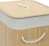 Close-up of the top and side of a bamboo laundry basket with a rope handle. Podgląd zdjęcia produktu