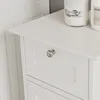 A close-up view of a white cabinet with a drawer and a silver knob. Podgląd zdjęcia produktu