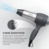 A dark gray and silver Bomann hair dryer is shown with blue air and bubbles emanating from the nozzle, against a white and light gray background. A close-up inset shows the speed settings dial. Text describes the product's features. Anteprima dell’immagine prodotto