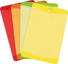 A set of four colorful cutting boards fanned out against a white background. Produktbild-Vorschau