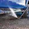 A blue car being washed with a pressure washer. Náhľad obrázku produktu