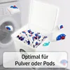 A white storage box filled with laundry detergent pods, with a washing machine in the background. Produktbild-Vorschau