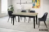 A dining room scene with a table and chairs. Produktbild-Vorschau