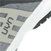 A close-up view of a grey shoe, showing the side profile and sole. Produktbild-Vorschau