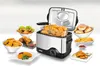 A deep fryer surrounded by various fried foods and accompaniments. Produktbild-Vorschau