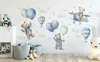 A nursery or child's room with wall stickers of teddy bears, balloons, and hot air balloons. Anteprima dell’immagine prodotto