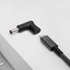A close-up shot of a USB-C to DC adapter cable, with the two ends separated. Produktbild-Vorschau