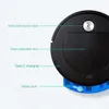 A close-up view of a black robot vacuum cleaner with blue attachments, with labels pointing to its features. Náhled obrázku produktu