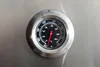 A close-up view of a thermometer on a stainless steel surface. Podgląd zdjęcia produktu