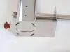 A close-up of a stainless steel smoking generator with a brown knob. Anteprima dell’immagine prodotto