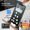 A smartphone displaying a smart app interface for controlling a kitchen appliance, placed on a wooden stand with other kitchen accessories. Produktbild-Vorschau