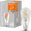 A product box for a smart LED filament light bulb, with the light bulb also shown outside the box. Produktbild-Vorschau