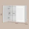 A white bathroom cabinet with a mirrored door and LED lighting, shown with dimensions indicated. Voir les images du produit