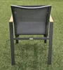 A chair from a patio furniture set is shown from the back, placed on artificial grass. Produktbild-Vorschau