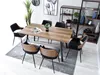 A dining room setting with a wooden table and chairs. Náhled obrázku produktu