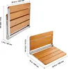 Two views of a foldable wooden shower seat with dimensions indicated. Produktbild-Vorschau