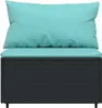 A close-up front view of a black rattan sofa with turquoise cushions. Podgląd zdjęcia produktu