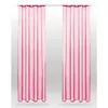 Two pink sheer curtains hanging from a rod. Produktbild-Vorschau