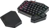 A black gaming keypad and a detachable wrist rest are shown on a white background. Produktbild-Vorschau