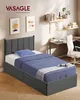 A bedroom scene with a bed, desk, and shelves. Náhled obrázku produktu