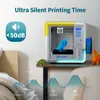 A 3D printer is shown on a desk next to a bed, with graphics illustrating sound levels. Náhľad obrázku produktu