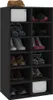 A black shoe rack filled with various shoes and a box. Produktbild-Vorschau