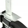 A close-up view of a furniture lifter mechanism. Náhled obrázku produktu