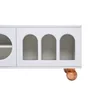 A close-up view of a white TV cabinet with arched openings and wooden ball feet. Anteprima dell’immagine prodotto