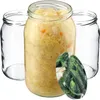 Three glass jars, one filled with sauerkraut, and a lid with a pickle design. Podgląd zdjęcia produktu