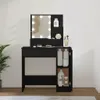A black vanity table with a lighted mirror and storage compartments. Voir les images du produit
