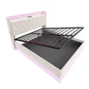 A beige upholstered bed frame with a tufted headboard, showing the open storage space and the metal bed frame with slats. Pink LED lights are visible along the base and headboard. Produktbild-Vorschau
