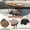 A round coffee table with a lower shelf, shown in a living room setting with a rug and sofa. Close-up details of the table's surface, edge, and feet are also shown. Anteprima dell’immagine prodotto