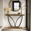 A console table with a lamp, books, and a vase of flowers in a hallway. Podgląd zdjęcia produktu