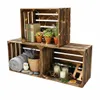 Three wooden crates stacked and decorated with various items. Náhled obrázku produktu