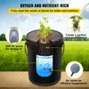 A hydroponic growing system set up outdoors with a plant growing in a bucket. Náhľad obrázku produktu