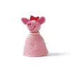 A felt egg warmer shaped like a pink pig wearing a red bow and a pearl necklace, set against a white background. Produktbild-Vorschau