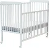 A white wooden baby crib with a mattress on a white background. Anteprima dell’immagine prodotto