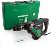 A rotary hammer drill and its carrying case are displayed on a white background, along with a small tube of lubricant. Produktbild-Vorschau