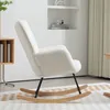 A white rocking chair with wooden rockers is shown in a well-lit room with a patterned rug. Náhled obrázku produktu
