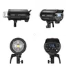 A collage of four images showing different views of a studio flash light. Produktbild-Vorschau