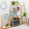 A bathroom or laundry room setup with shelving and accessories. Náhled obrázku produktu