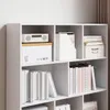 A white, multi-shelf bookcase filled with books and storage boxes. Produktbild-Vorschau