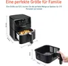 An air fryer with dimensions shown, and a separate basket being held. Produktbild-Vorschau